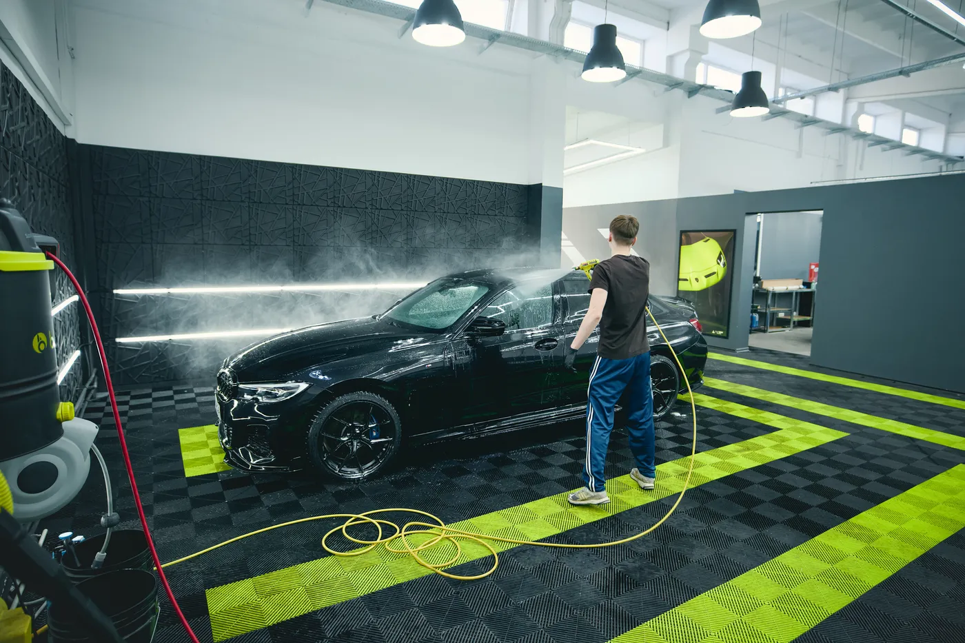 Clean, well-lit pre-wash bay in a detailing studio in Warsaw